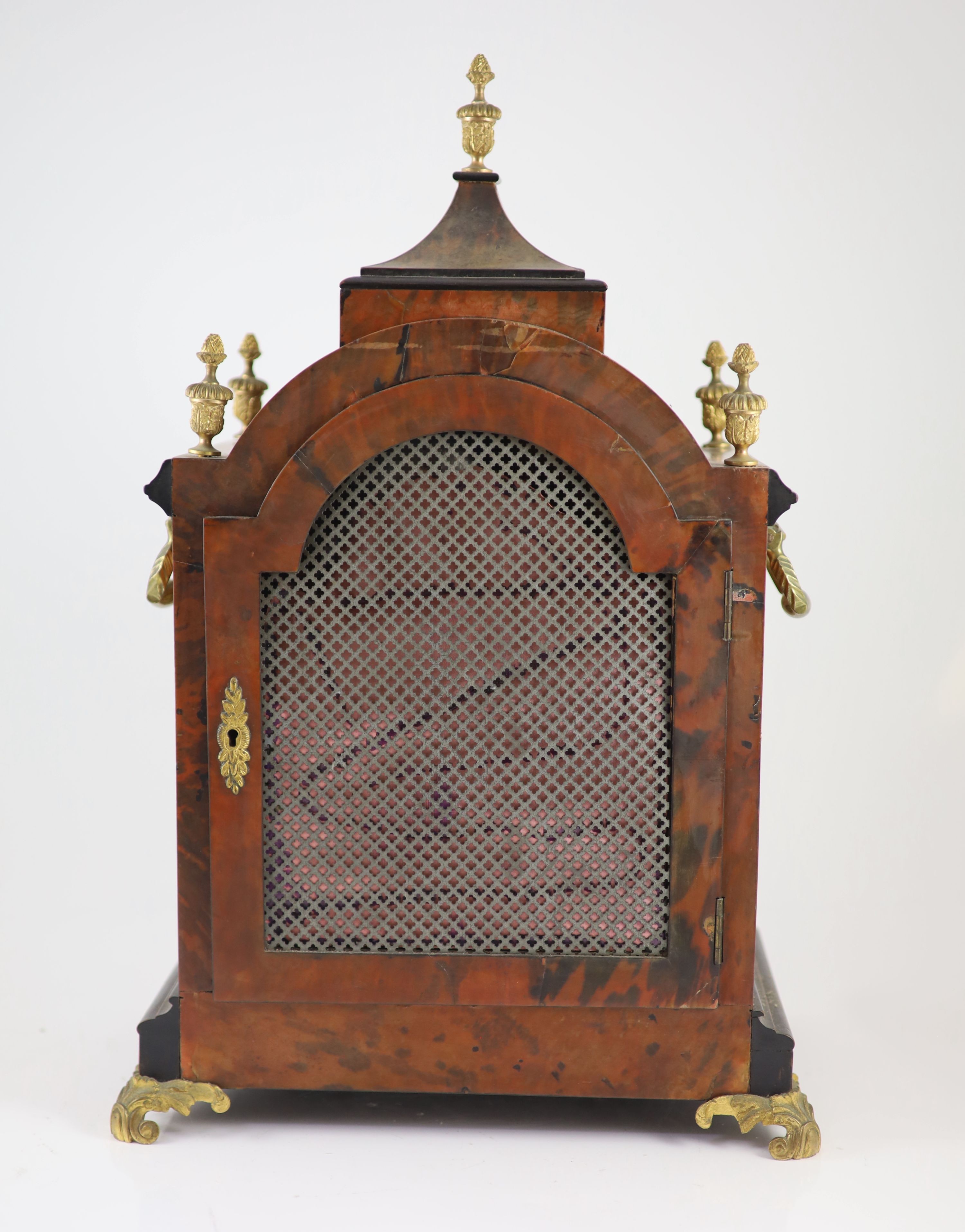 A late Victorian faux tortoiseshell and ebonised mantel clock 48cm high, 35 x 21cm